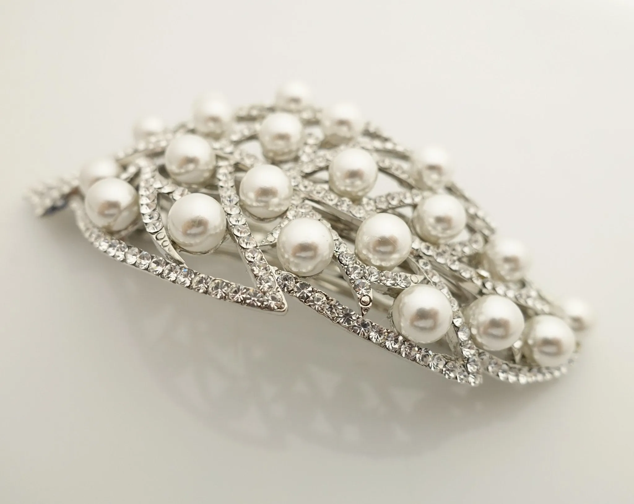 pearl rhinestone decorated leaf wave bow french barrette