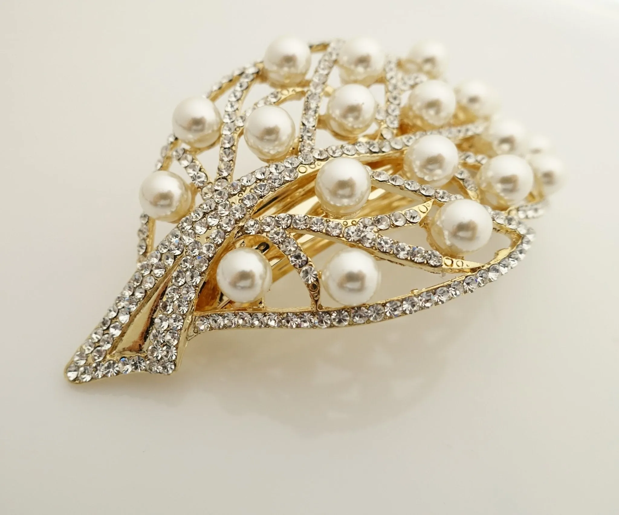 pearl rhinestone decorated leaf wave bow french barrette